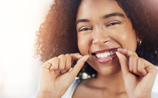 istock I floss for a healthier smile 1066947564