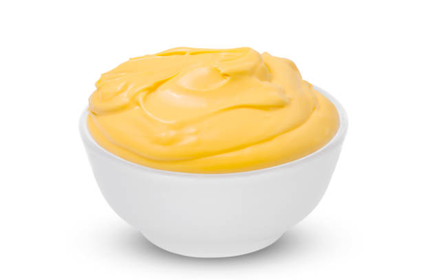 istock One Bowl with tasty cheese sauce on white background 1066948208