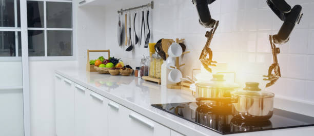 istock smart handy dexterous chef robotic assistant in kitchen technology concept, robot hand receive an order and cooking the recipe by program and it can self-teaching technology for update the new menu 1066949484