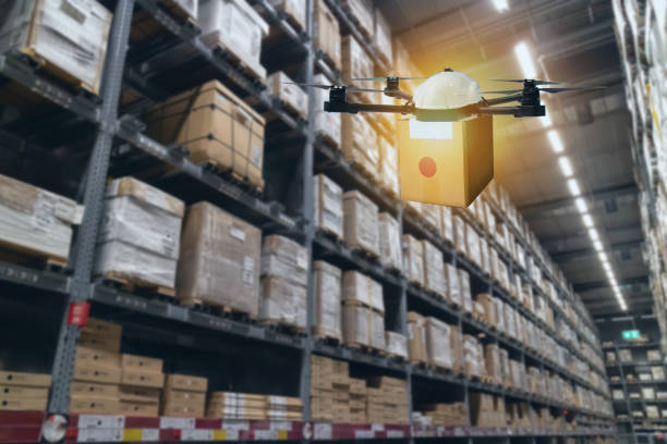 istock drone flying transportation in smart warehouse concept, a retail use a drone(artificial intelligence technology delivery to send a tool kit, product, fruit, vegetable, etc in the store,  to customer 1066949516