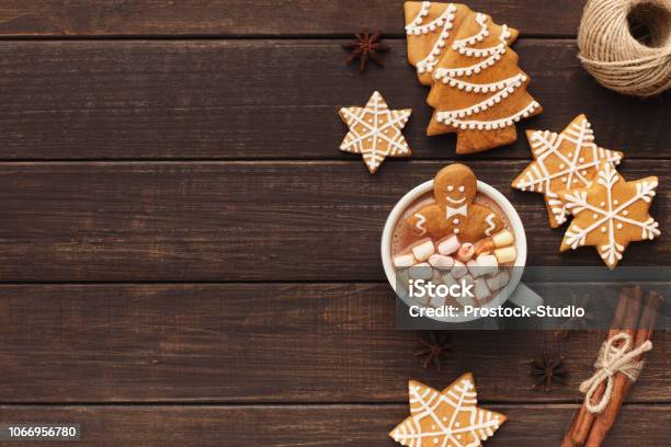 Gingerbread Man Bathing In Cup Of Hot Chocolate Stock Photo - Download Image Now - Christmas, Vacations, Holiday - Event