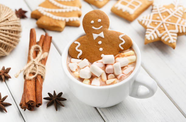 istock Gingerbread cookie man in cup of hot chocolate 1066956800