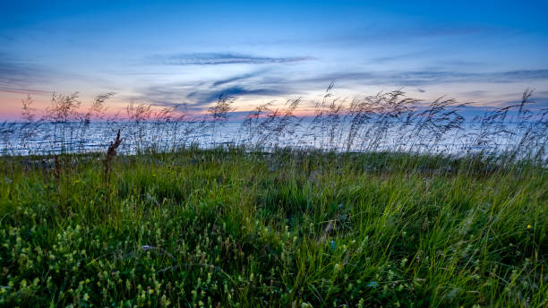 istock red saturated colors in sunset over the sea 1066960428