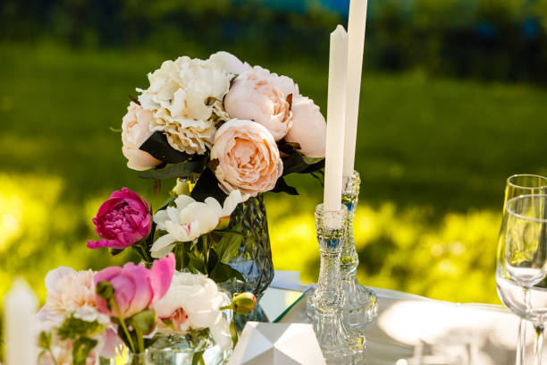 istock Wedding table decor with candles and flowers 1066963948