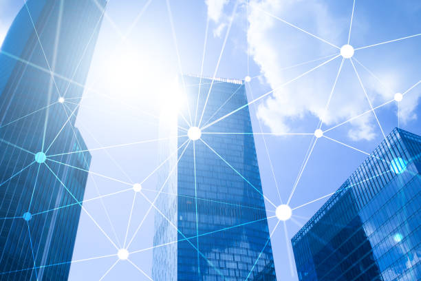 istock Blockchain network on blurred skyscrapers background. Financial technology and communication concept. 1066964500