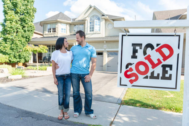 istock Smiling house buyers 1066965610