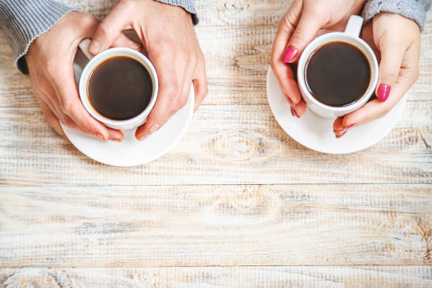 istock Cup drink for Breakfast in the hands of lovers. Selective focus. 1066965656