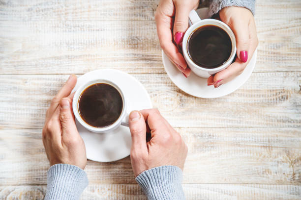 istock Cup drink for Breakfast in the hands of lovers. Selective focus. 1066965662