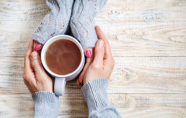 istock Cup drink for Breakfast in the hands of lovers. Selective focus. 1066965678