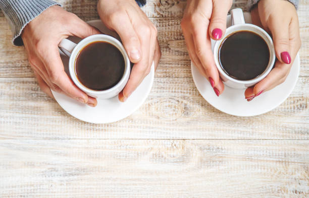 istock Cup drink for Breakfast in the hands of lovers. Selective focus. 1066965684