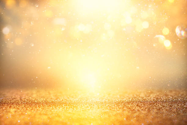 istock glitter vintage lights background. silver and gold. de-focused. 1066966732