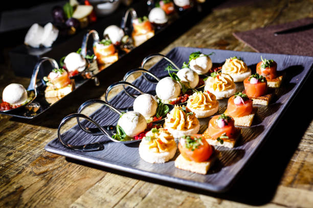 istock Fresh tasty canapes on a tray 1066974852