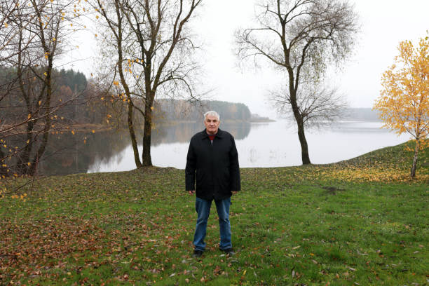 istock Man on Zaslavsky Reservoir background 1066977304