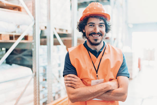 istock Portrait of a smiling manual worker with protective workwear 1066978170