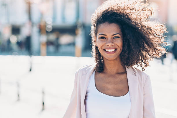 istock Happy young woman at sunlight 1066978222