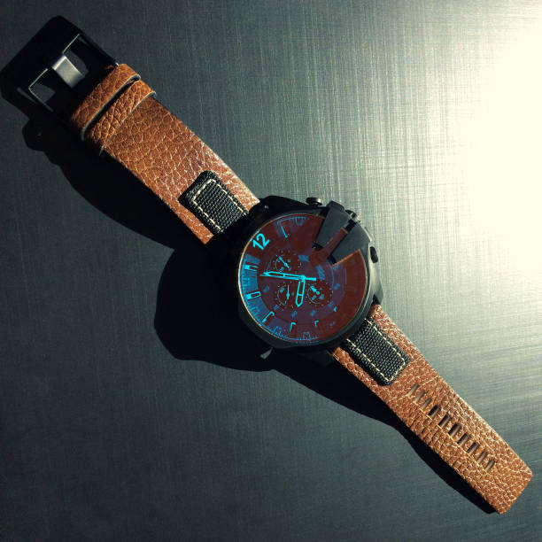istock wrist watch with leather strap on a dark background 1066983522