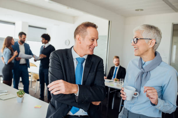 istock Happy older business people 1066990674