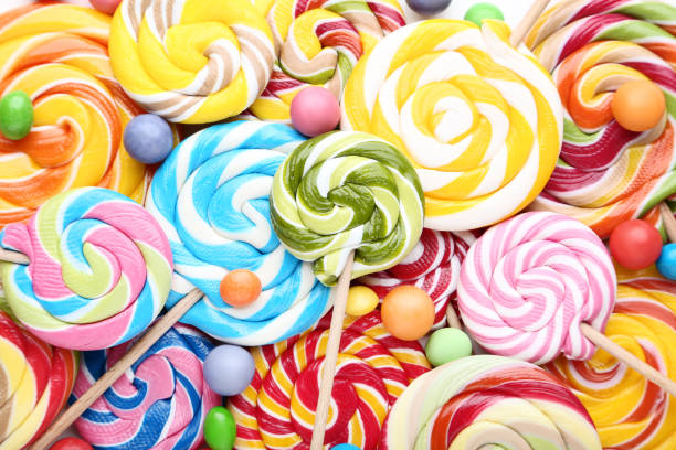 background of sweet candies and lollipops - pirulito imagens e fotografias de stock