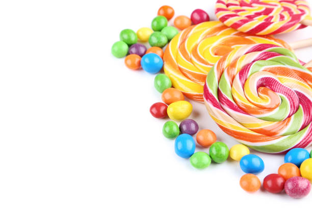 istock Sweet candies and lollipops on white background 1066992584