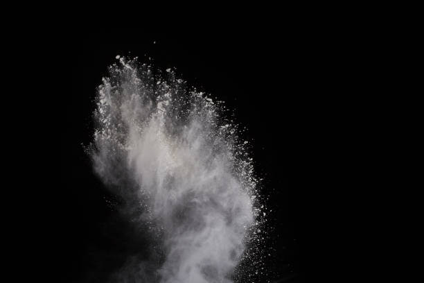 istock White powder explosion on white background. Colored cloud. Colorful dust explode. Paint Holi. 1066992874