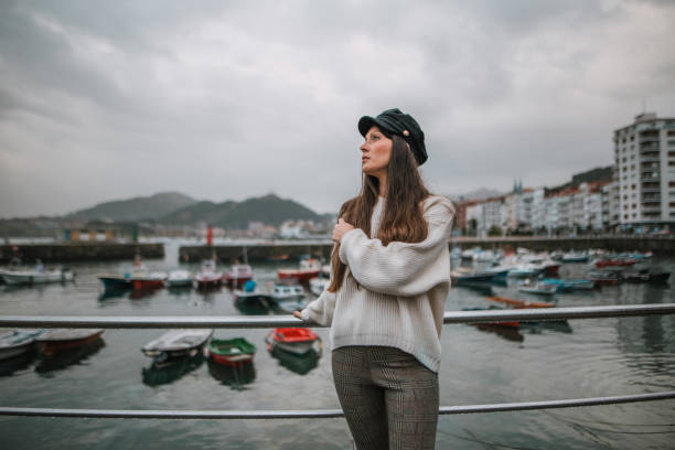 istock Young woman by the sea 1066995010