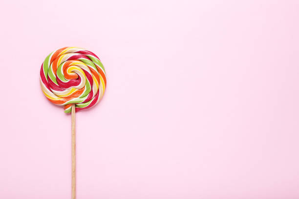 istock Colorful lollipop on pink background 1066997030