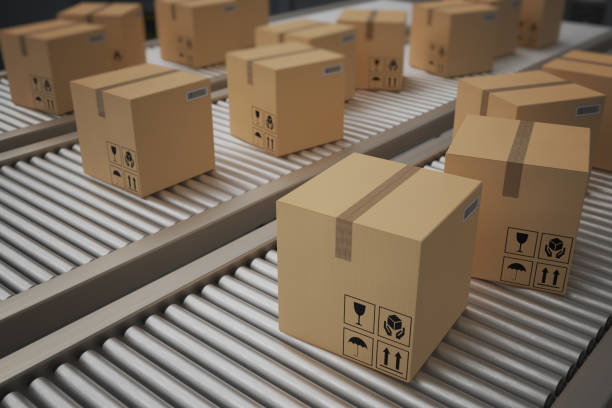 istock Conveyor with many cardboard boxes. Package delivery concept. 3D rendered illustration. 1066998148