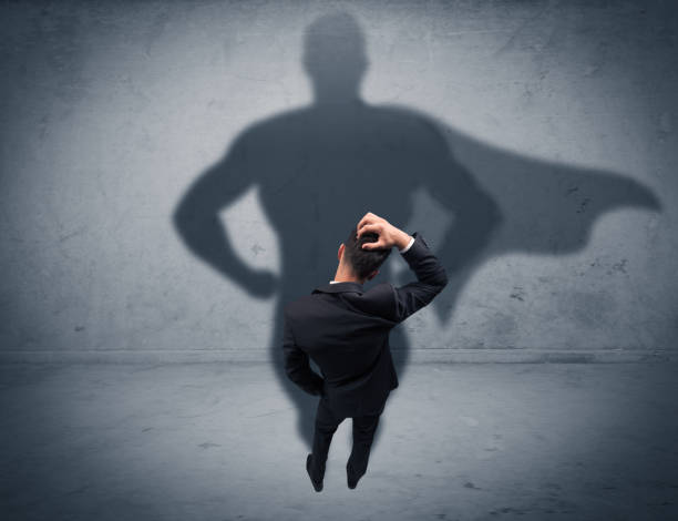 istock Successful businessman with superhero shadow 1066998906