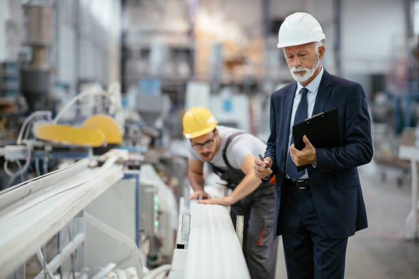 istock Engineers team in factory 1066999298