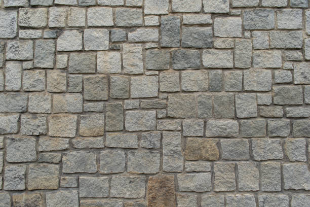 istock Texture of the granite stone wall for background 1067000096