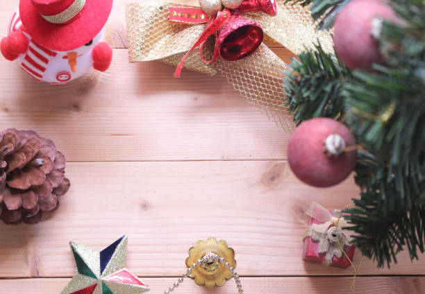 istock Christmas tree background with decorations on wooden board 1067000172