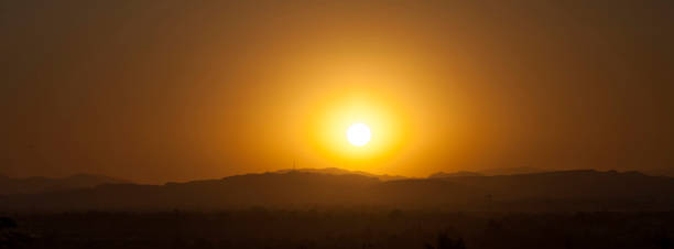 istock Sunset on the background of the mountains 1067003578