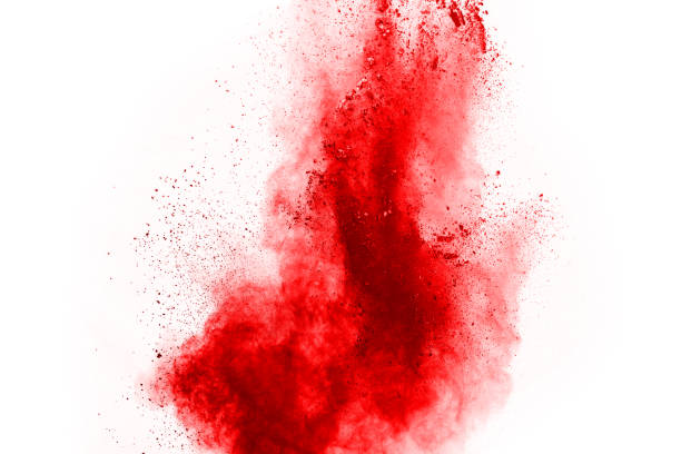 istock Freeze motion of red powder exploding, isolated on white background. Abstract design of red dust cloud. Particles explosion screen saver, wallpaper 1067005108