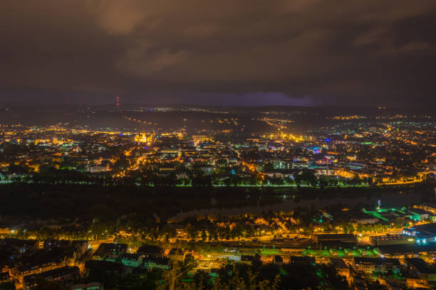 istock View on german city by night 1067007846