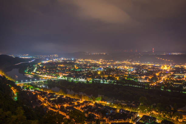 istock View on german city by night 1067008836