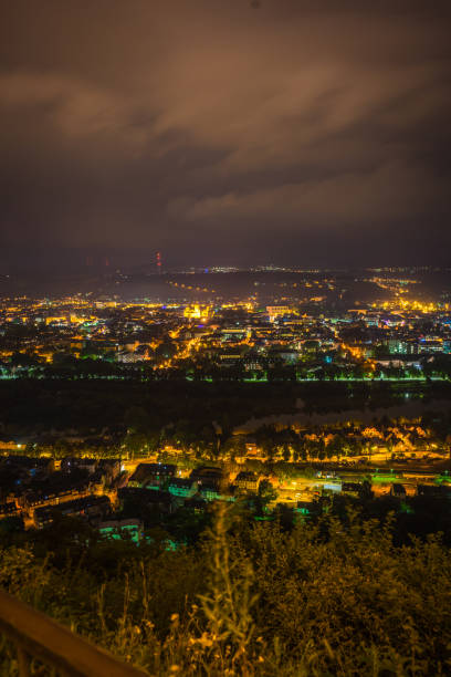 istock View on german city by night 1067008852