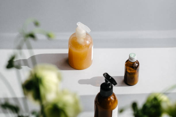 istock Bottles with organic cosmetics in light and shadows 1067009446