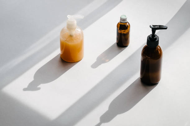 Bottles with organic cosmetics overhead stock photo