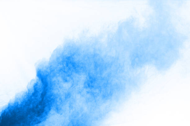 istock Blue powder explosion on white background. Colored cloud. Colorful dust explode. Paint Holi. 1067014766