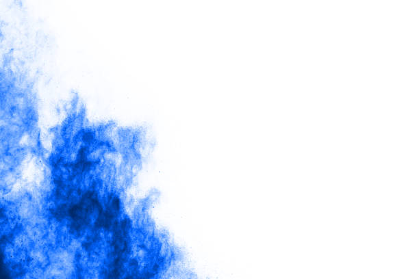 istock Blue powder explosion on white background. Colored cloud. Colorful dust explode. Paint Holi. 1067014968
