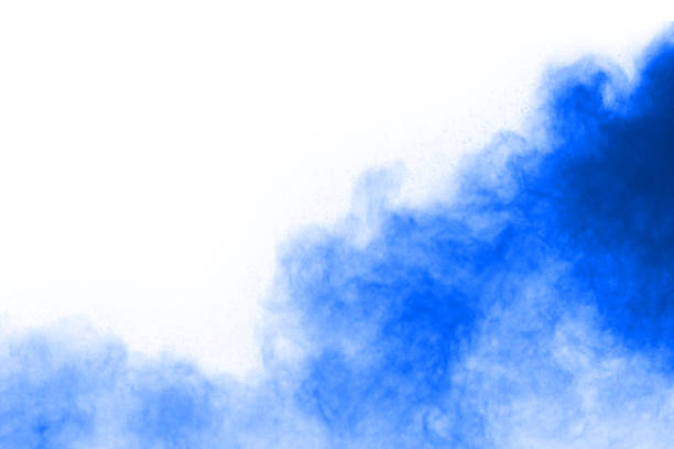 istock Blue powder explosion on white background. Colored cloud. Colorful dust explode. Paint Holi. 1067015018