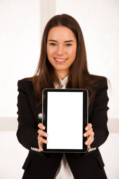 istock asian caucasian business woman browsing web on tablet computer 1067015206
