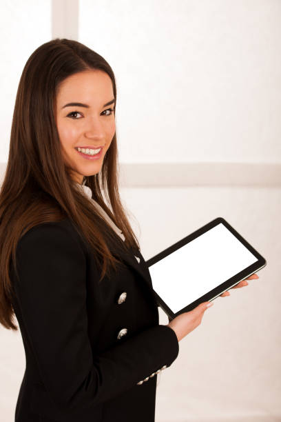 istock asian caucasian business woman browsing web on tablet computer 1067015220