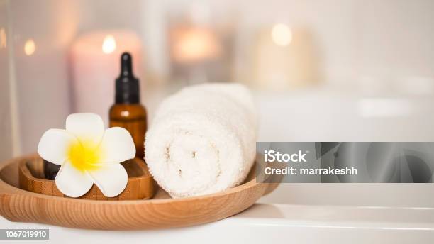 https://media.istockphoto.com/id/1067019910/photo/spa-setting-with-frangipani-flower-towel-and-body-oil-bath-home-spa-skin-and-body-care.jpg?s=612x612&w=is&k=20&c=jD4rXsl71A2_BDdSCOFAkw5c-bRUodgzS0eOU3lYhaM=