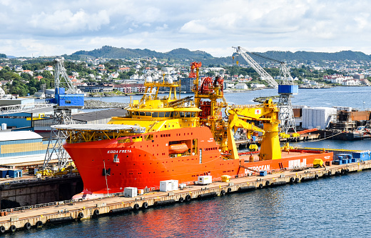Haugesund, Norway – July 18, 2017: The Offshore Construction Vessel (OCV) EDDA FREYA of the company DeepOcean is in a dry dock of a shipyard in Haugesund in Norway.