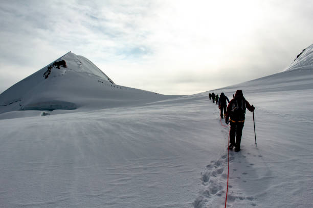 istock Mountaineers on a glacier 1067029764