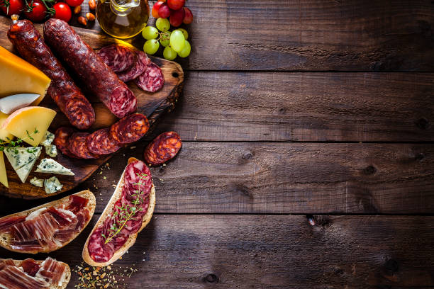istock Food backgrounds: spanish chorizo and cheeses 1067031858