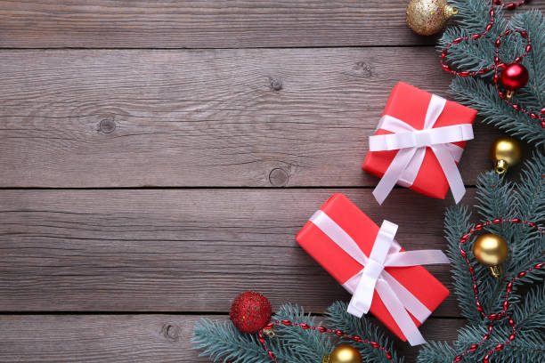 istock Christmas gifts presents with decorations on a grey background. 1067032120
