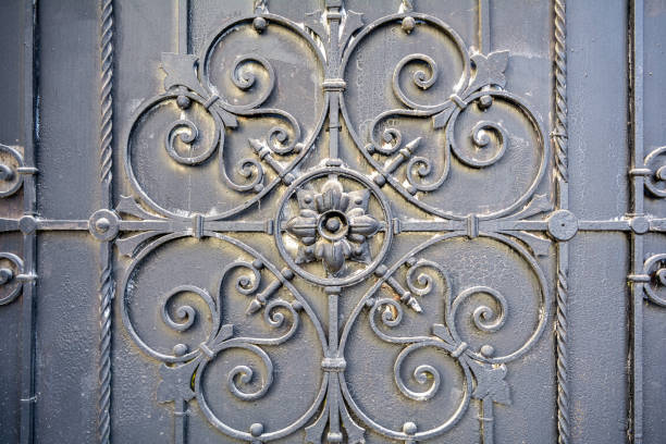 istock Element of architectural decor lattice, exterior. Metal wrought iron gate 1067032316