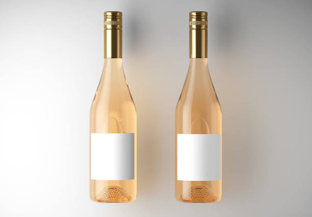 mockup 2 bottiglia di vini rosa su uno studio bianco. rendering 3d. - bottle wine white blank foto e immagini stock